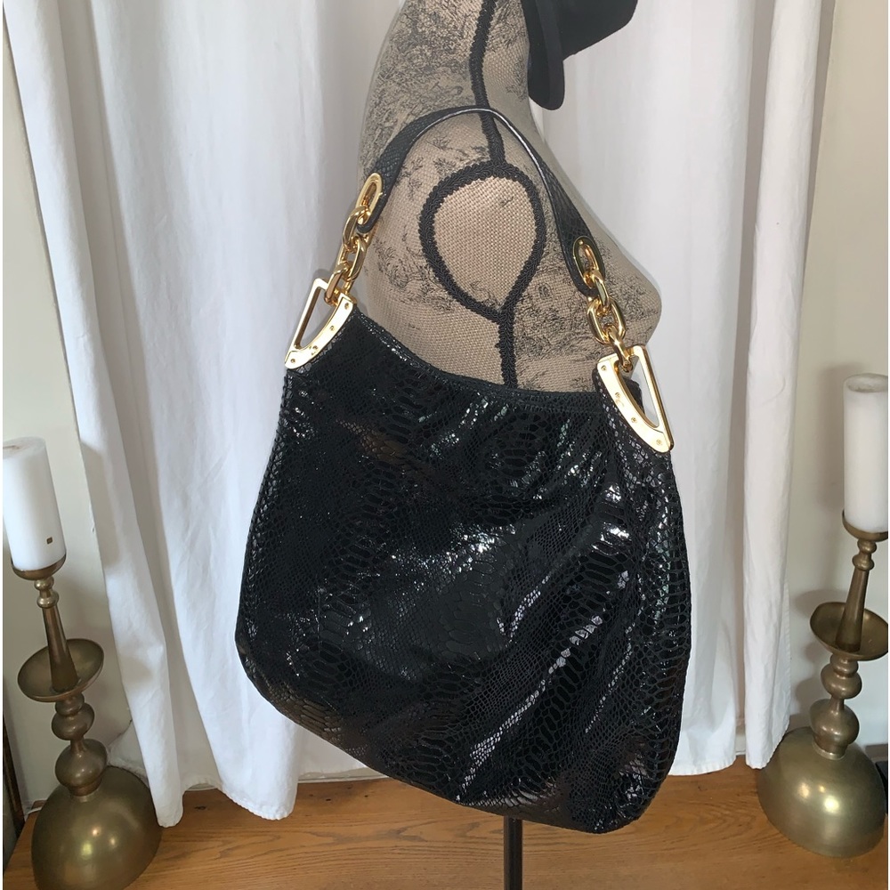 Michael Kors hobo bag gently used. Black python embossed patent leather MINT